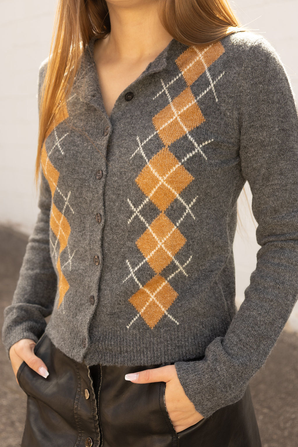 Grey cardigan with argyle pattern on the front