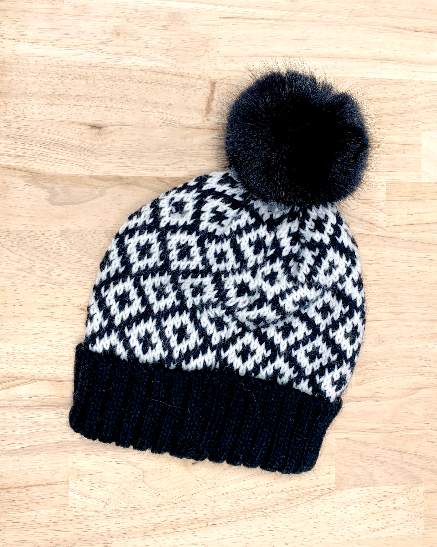knitted beanie with puff ball