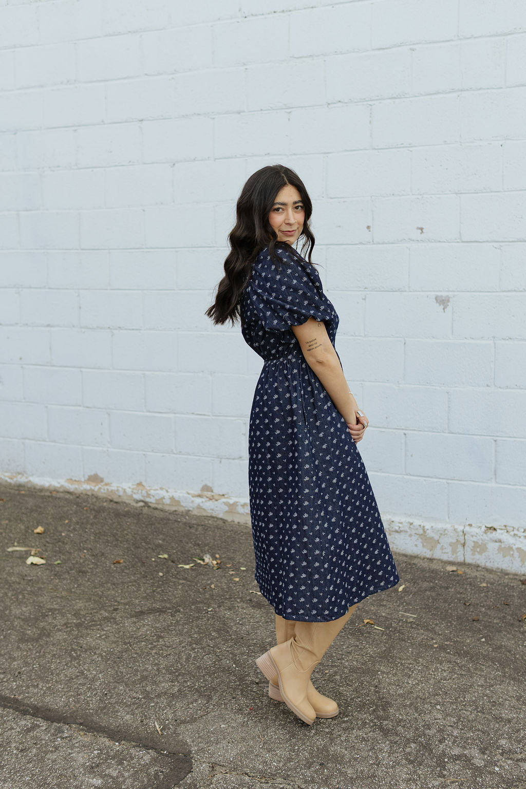Indigo denim dress with white floral embroidery and puff sleeves