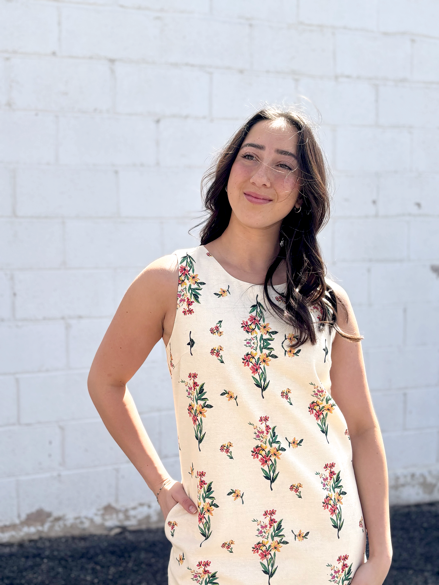 Cute short sleeveless dress with floral pattern