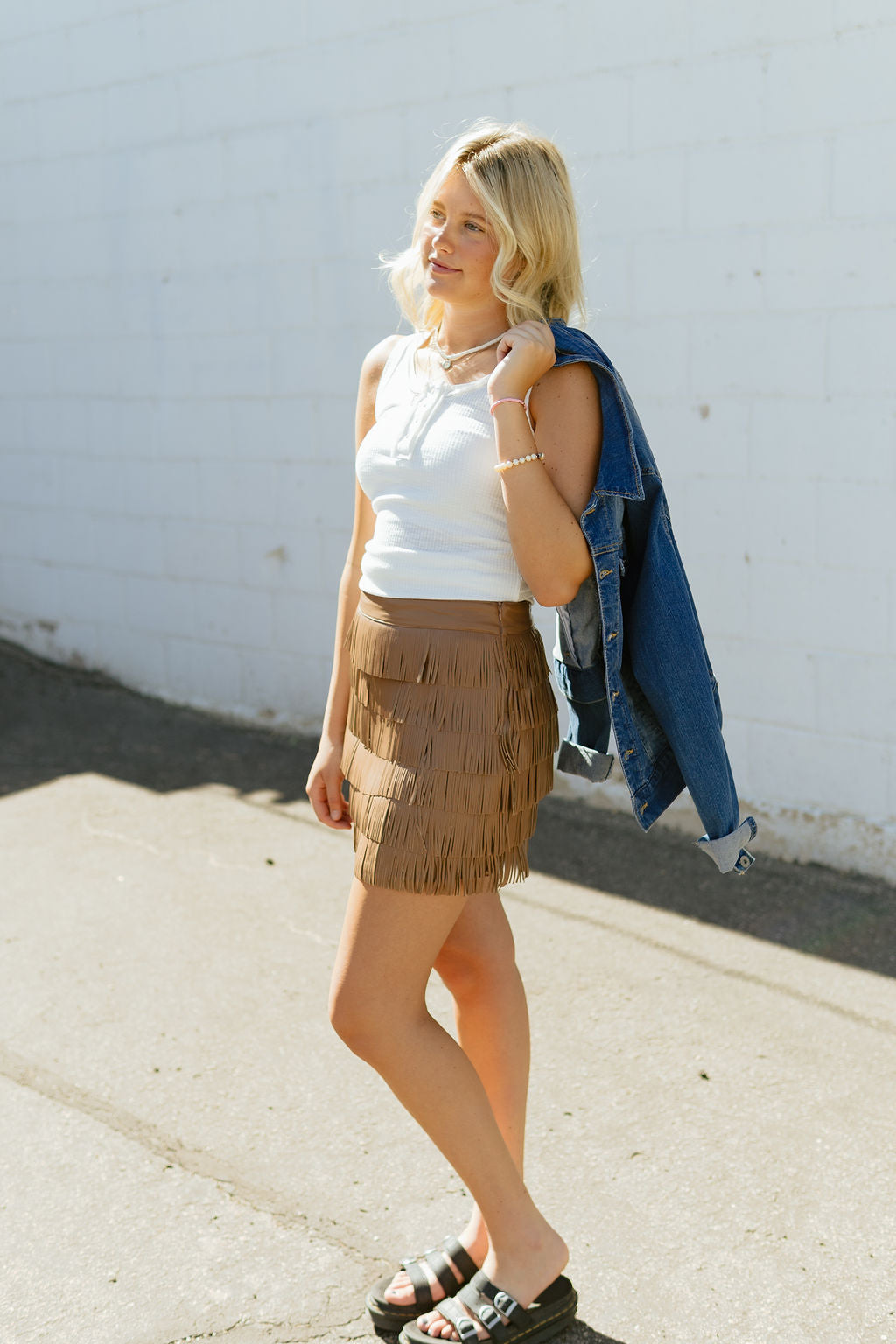 Tan fringe mini skirt