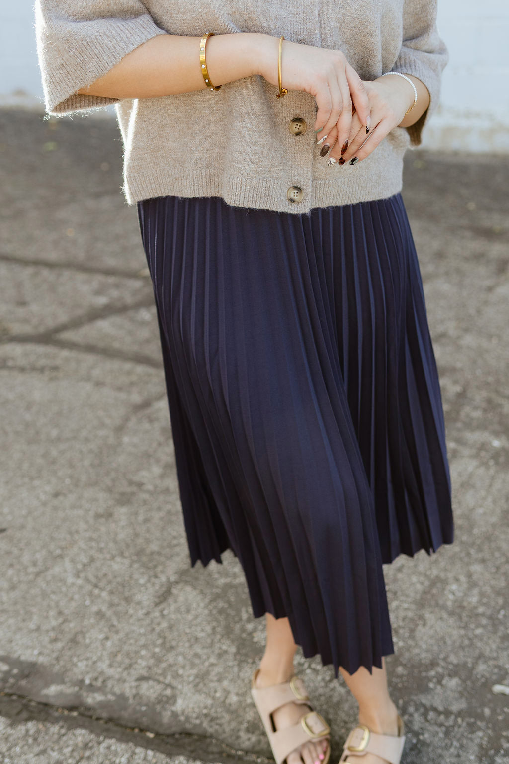 Pleated midi skirt in navy blue