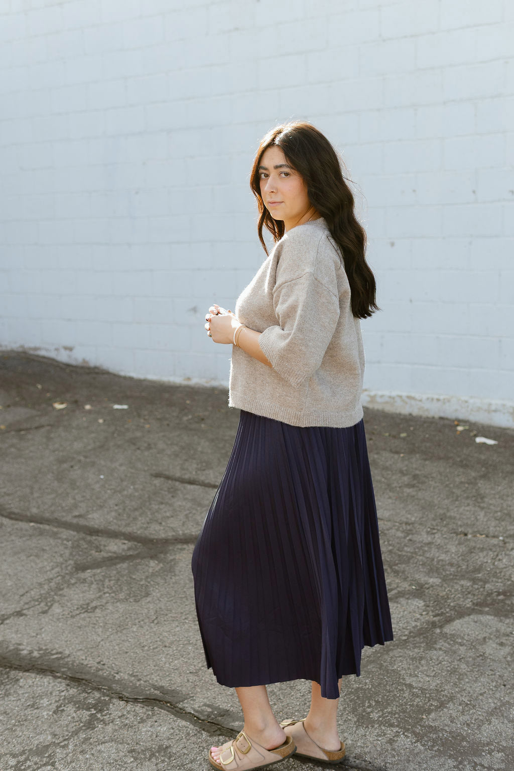 Pleated midi skirt in navy blue