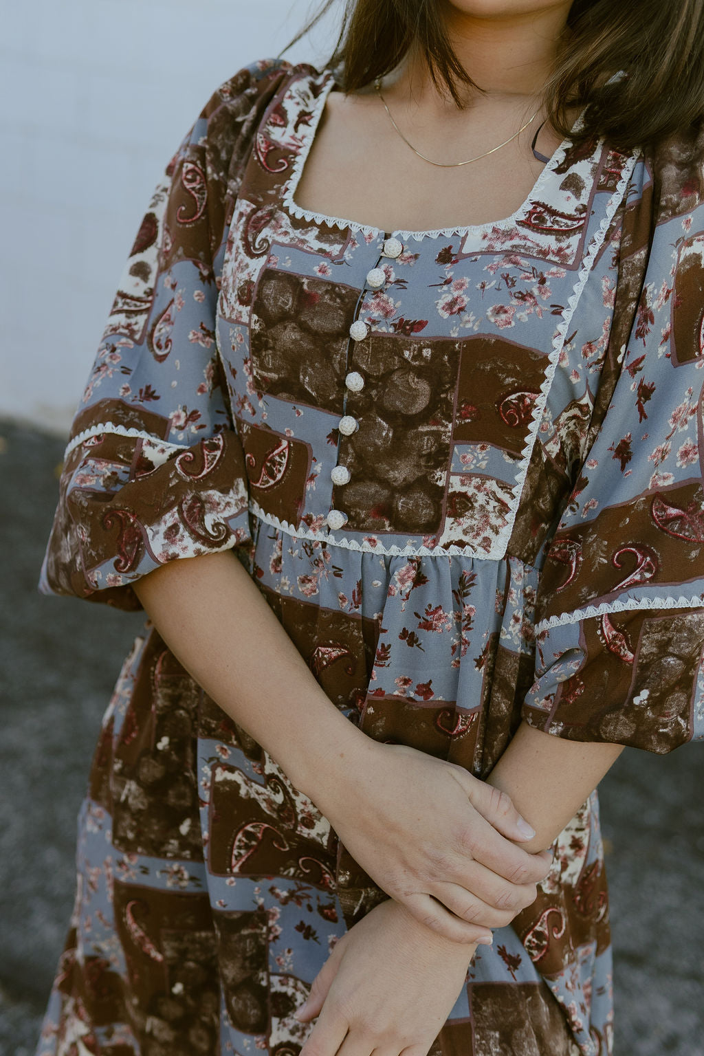 patchwork print dress with a blue and brown color