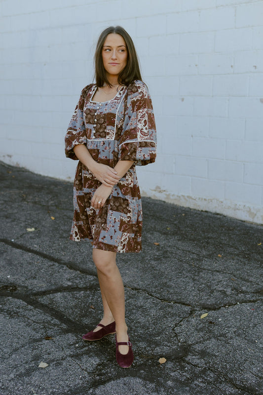 patchwork print dress with a blue and brown color