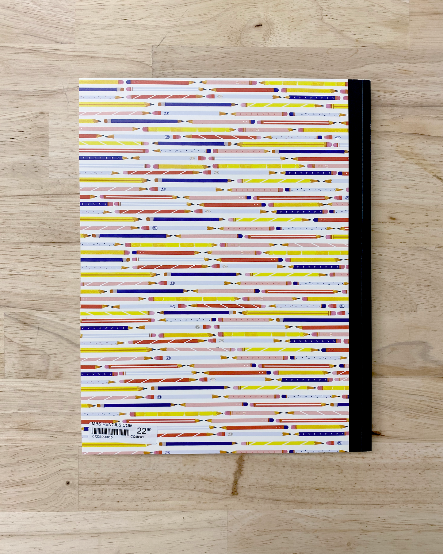 Cute composition notebook with illustrated pencils on the front and back cover