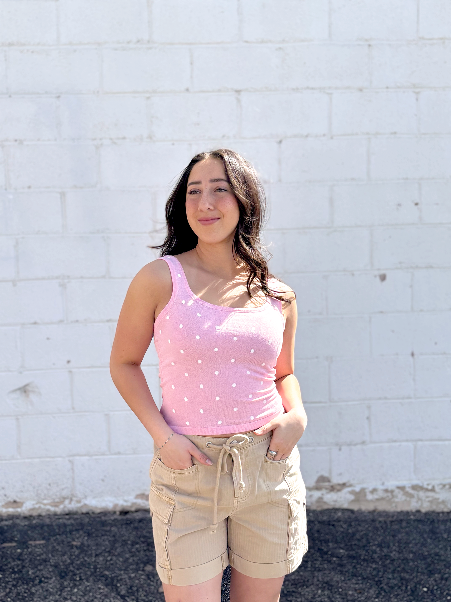 pink tank top with small white polka dots