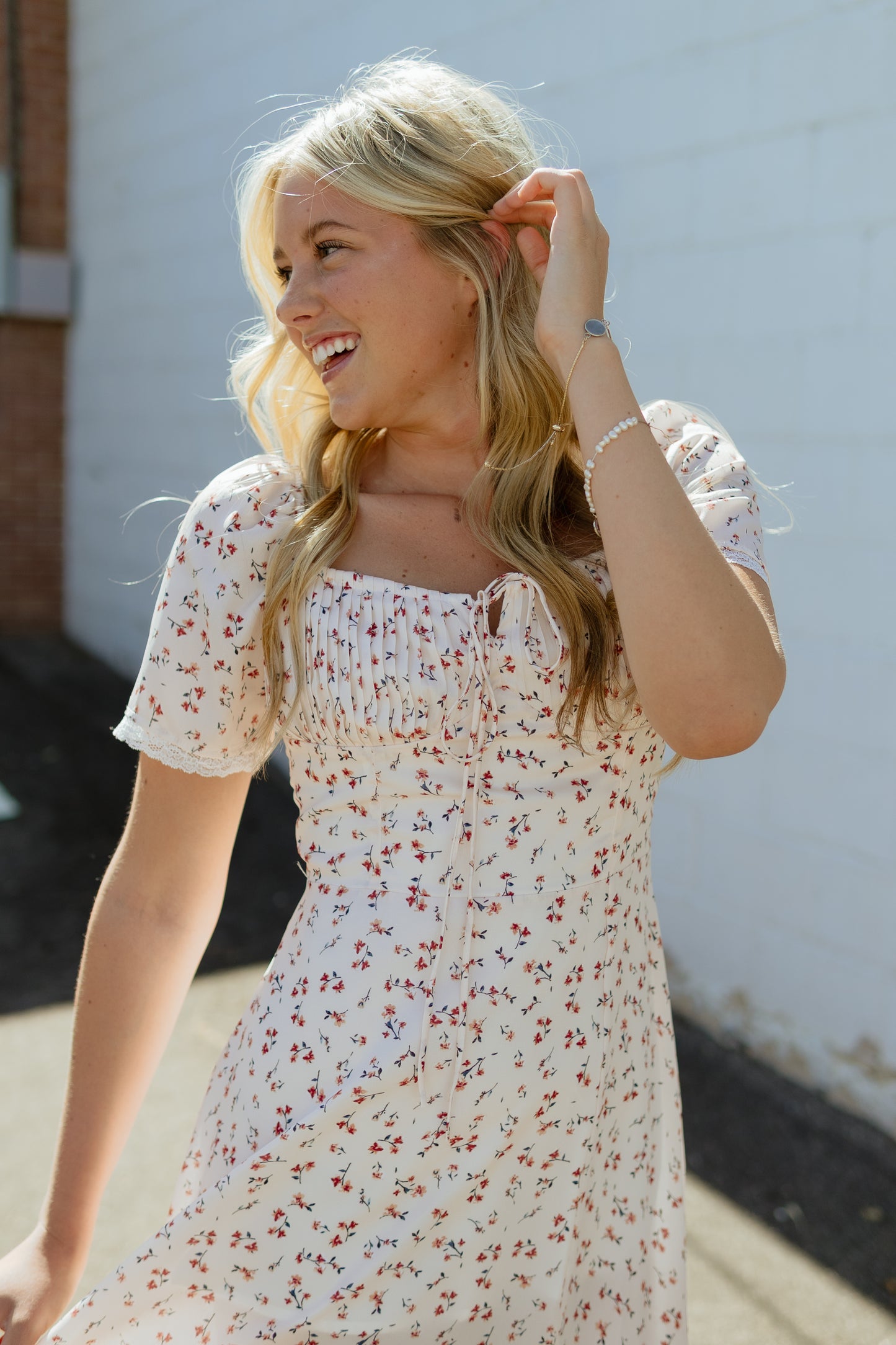 Beautiful Ivory dress with light red floral pattern and pleated bust