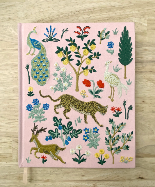 Sketchbook with embroidered cover of jungle animals from Rifle Paper Co