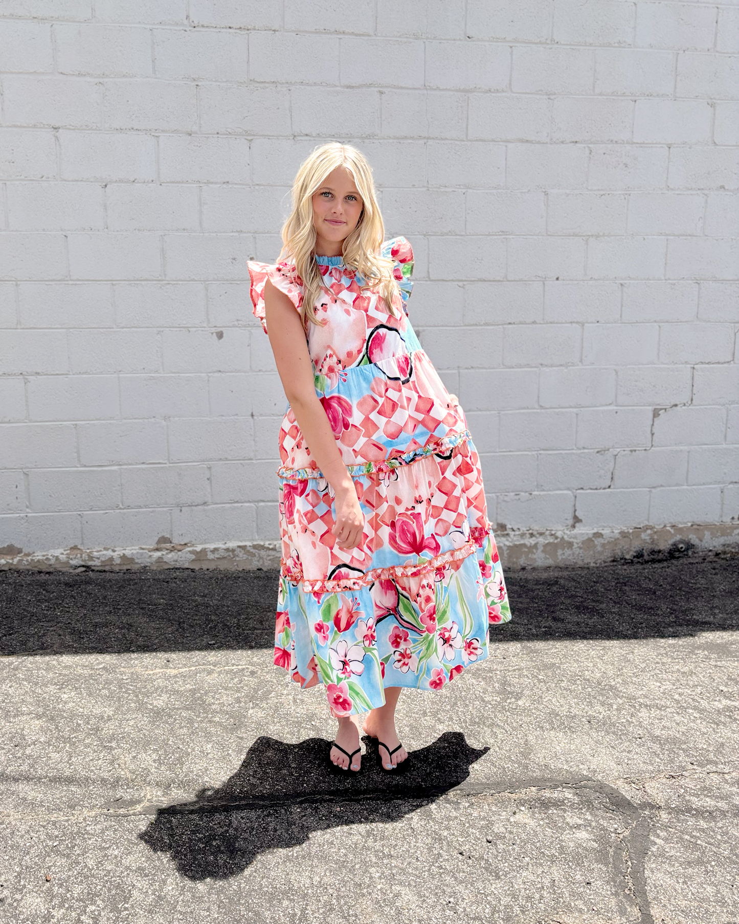 Summer sleeveless dress with large floral print in red and blue