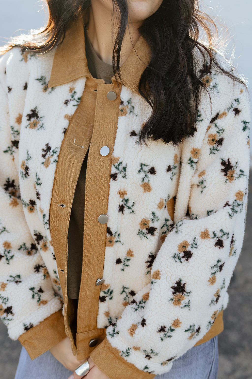shearling jacket with floral print and tan accents