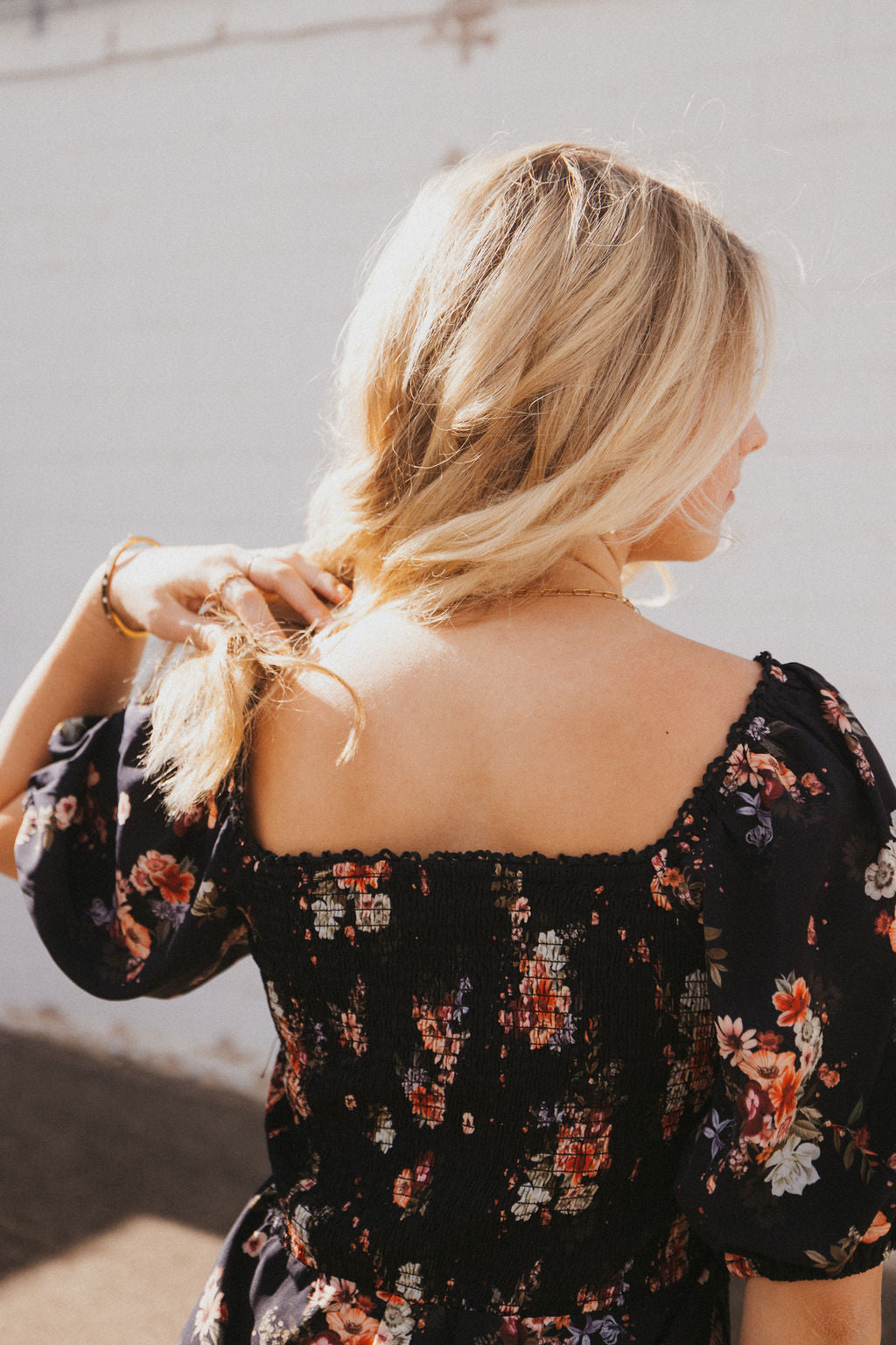 black dress with fall floral pattern and black lace trim