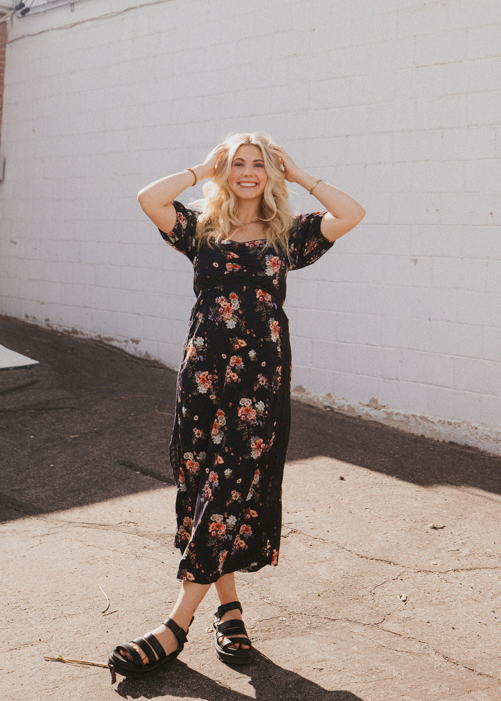 black dress with fall floral pattern and black lace trim