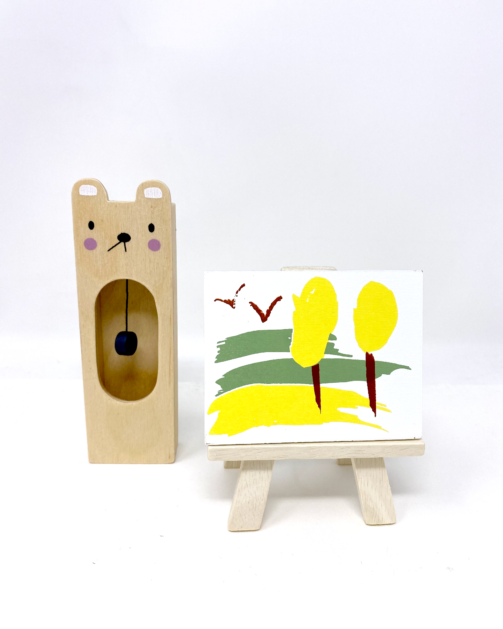 Dollhouse study furniture with clock, beanbag, couch, artist easel, and desk