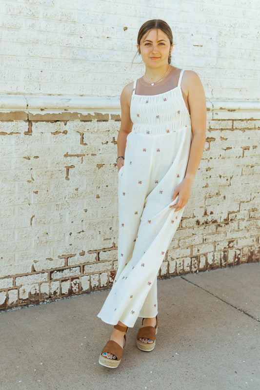 linen jumpsuit with embroidered flowers