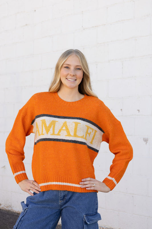 cute orange sweater with Amalfi across the front