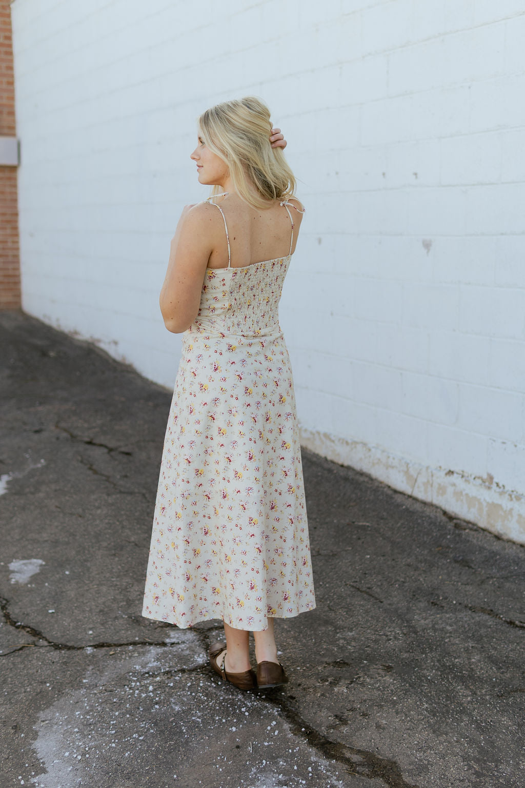 beige dress with red and yellow flower print
