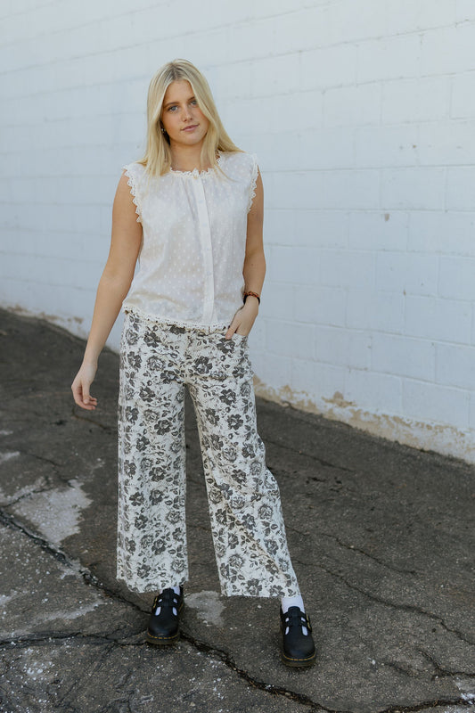 Ivory jeans with grey floral pattern
