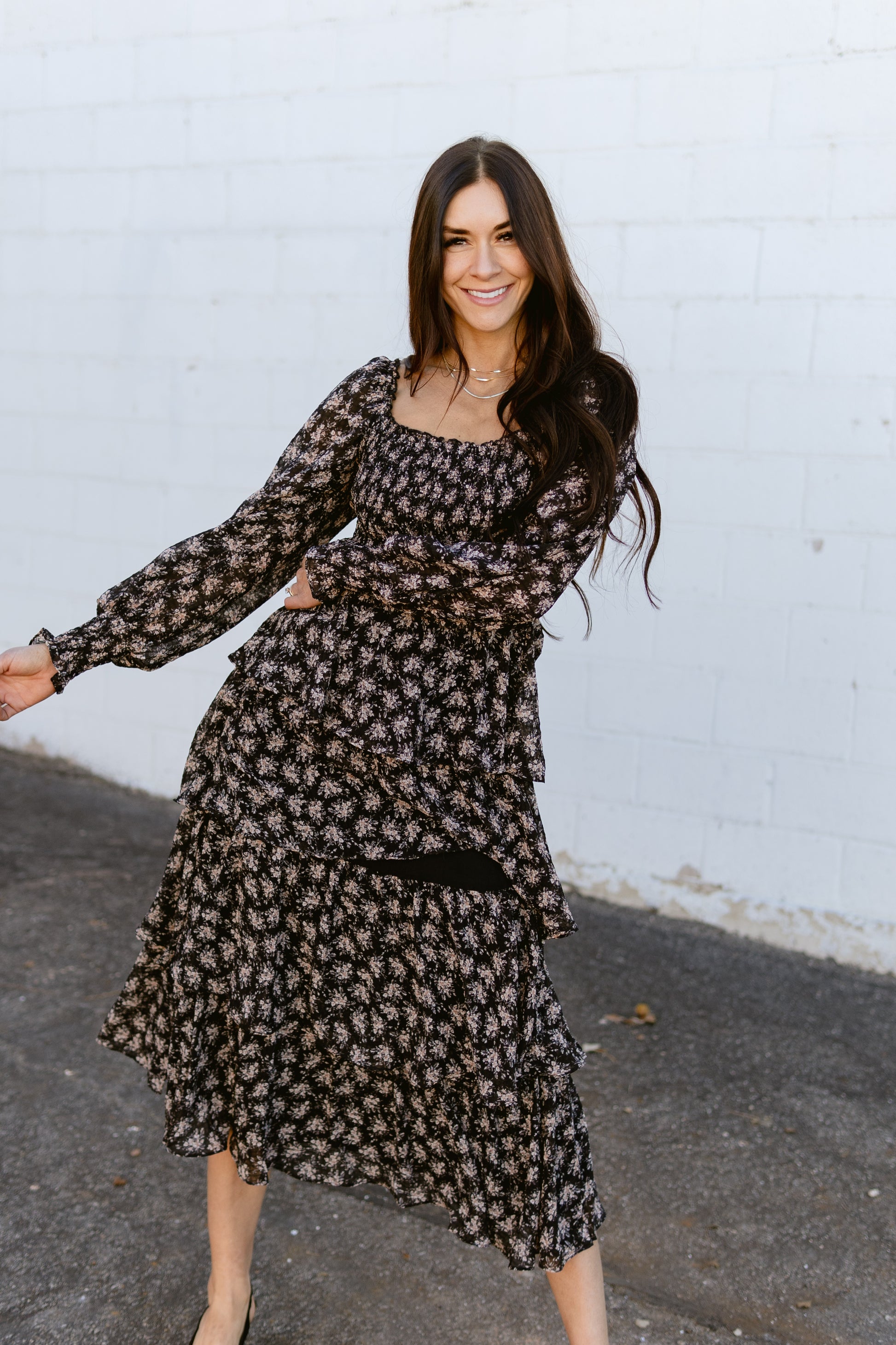 black floral dress with tan floral details