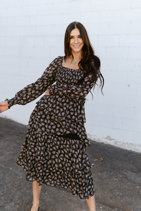 black floral dress with tan floral details