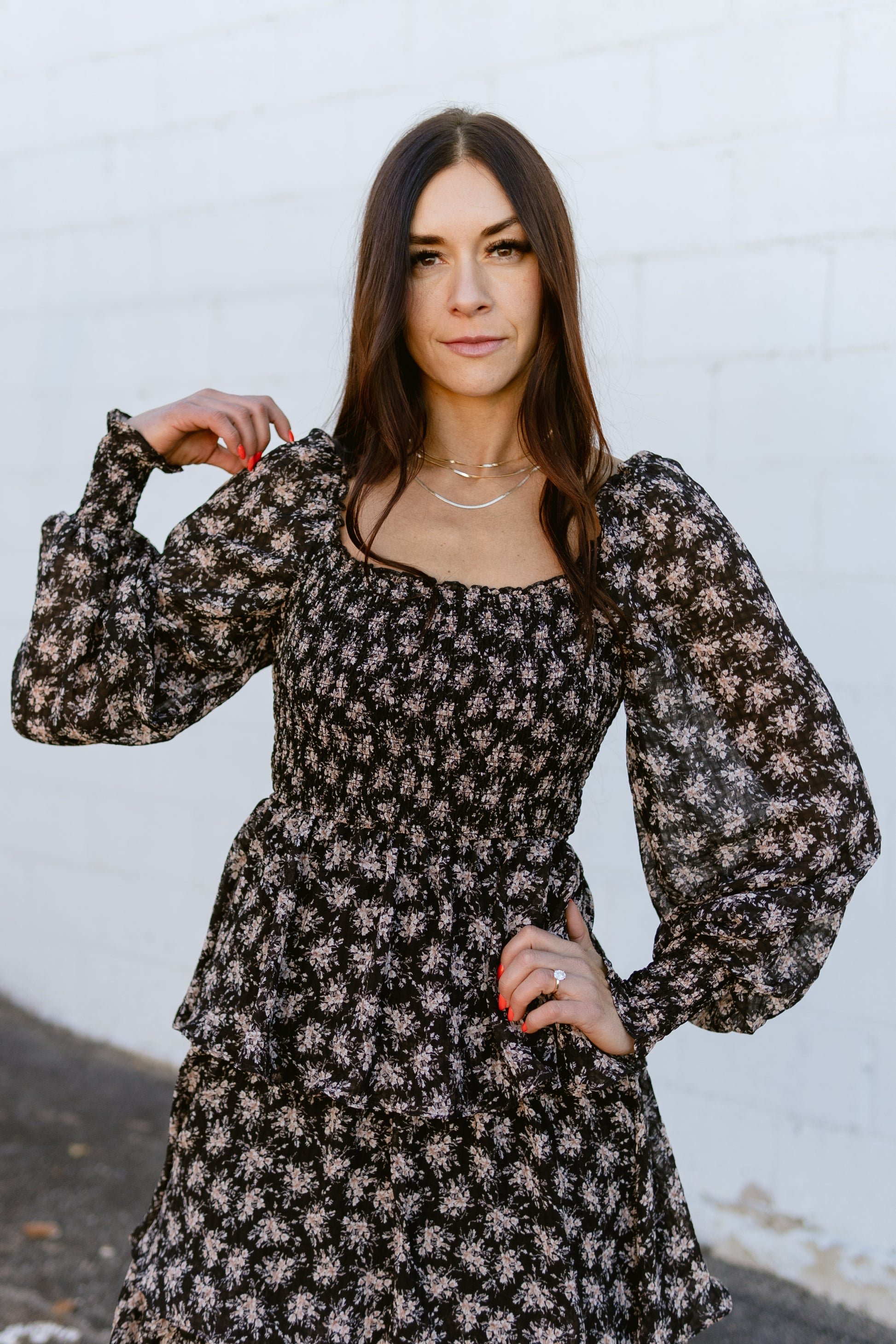 black floral dress with tan floral details