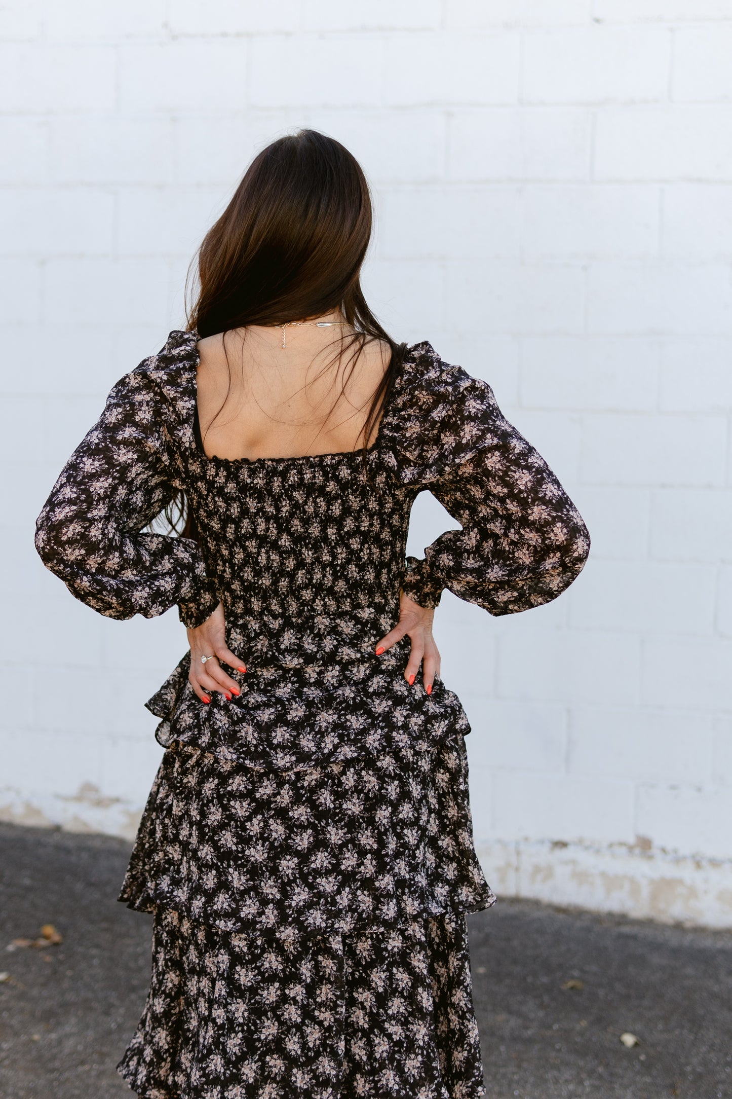 black floral dress with tan floral details