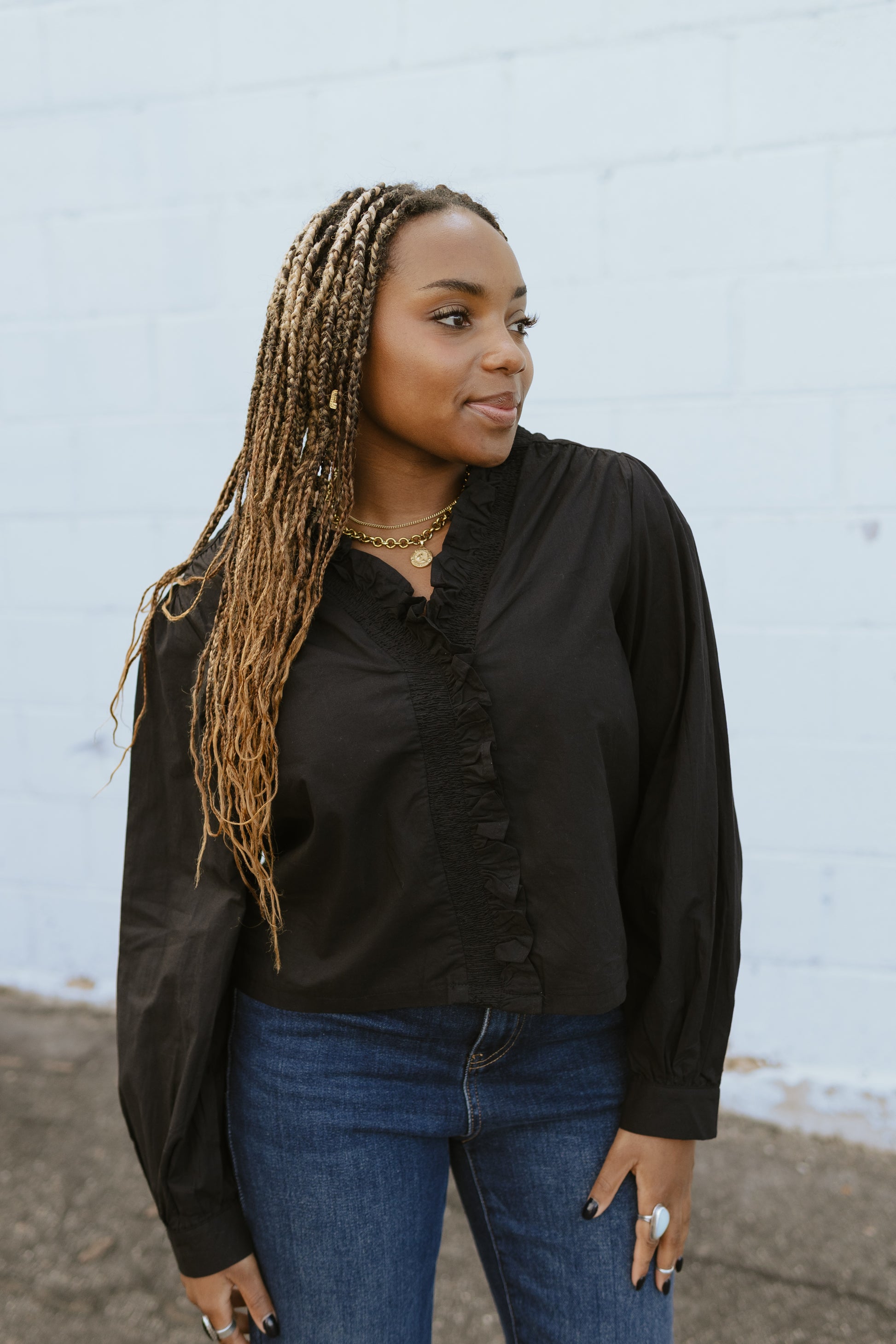 Black ruffle neck blouse