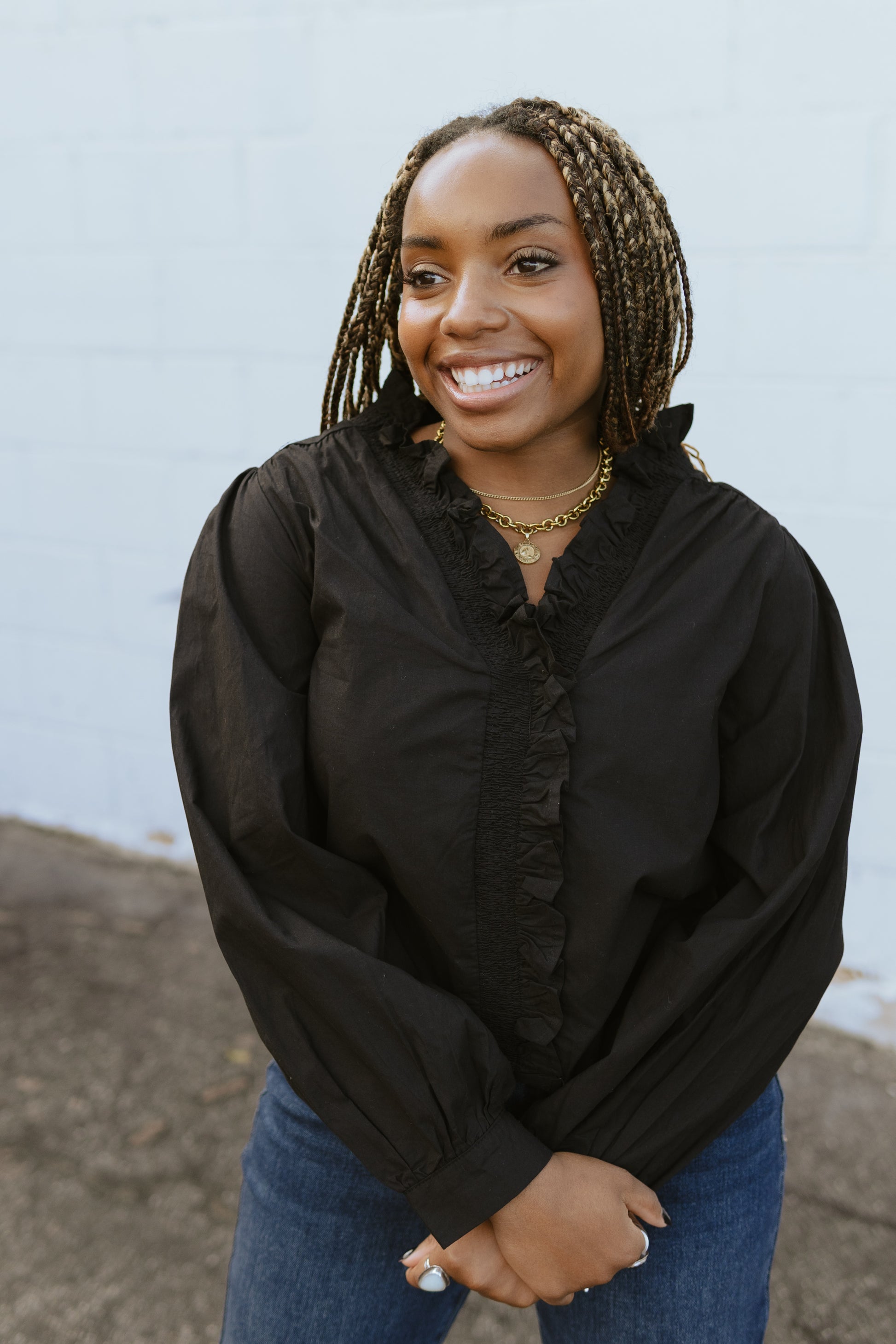 Black ruffle neck blouse