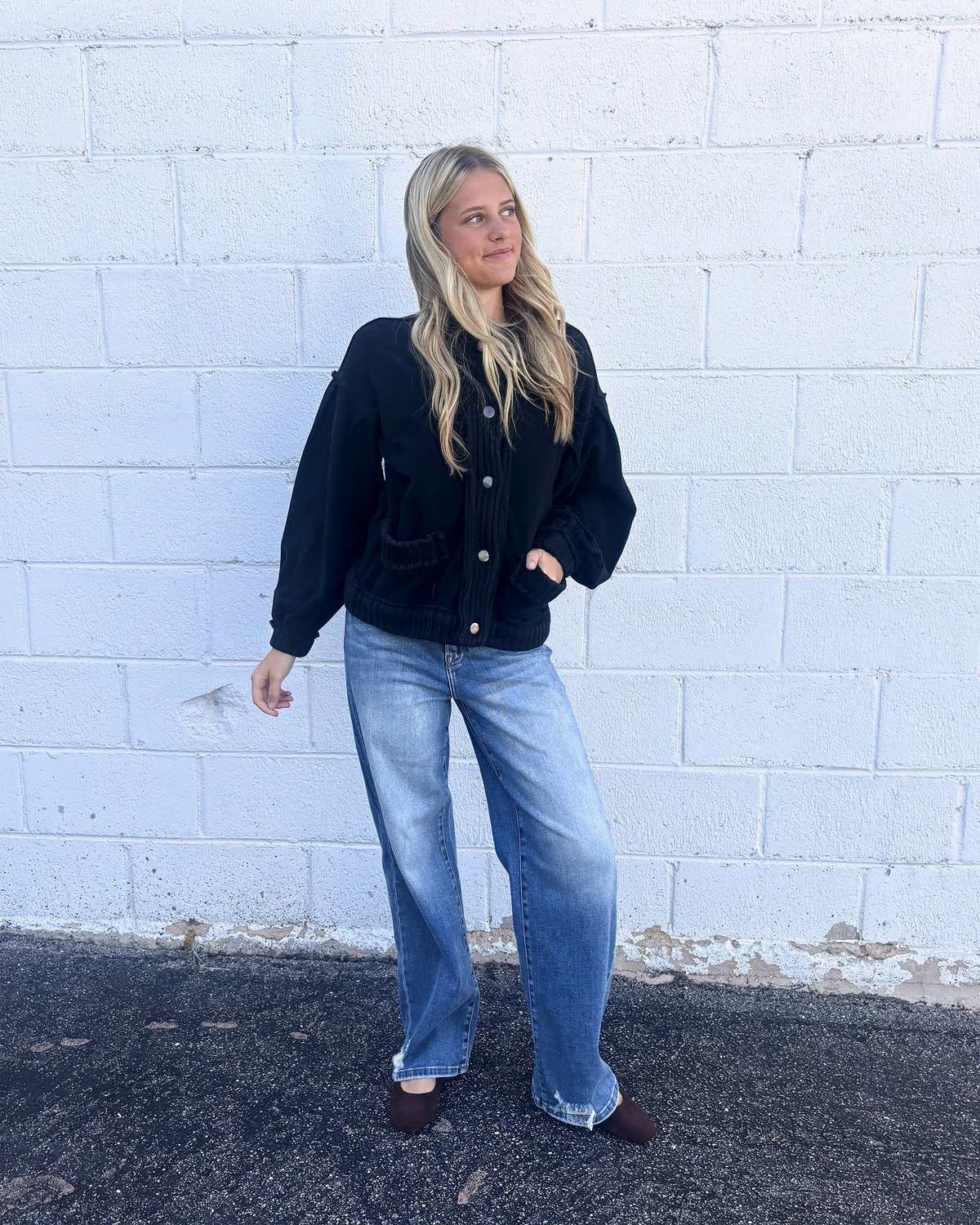 Black , loose fitting sweater jacket