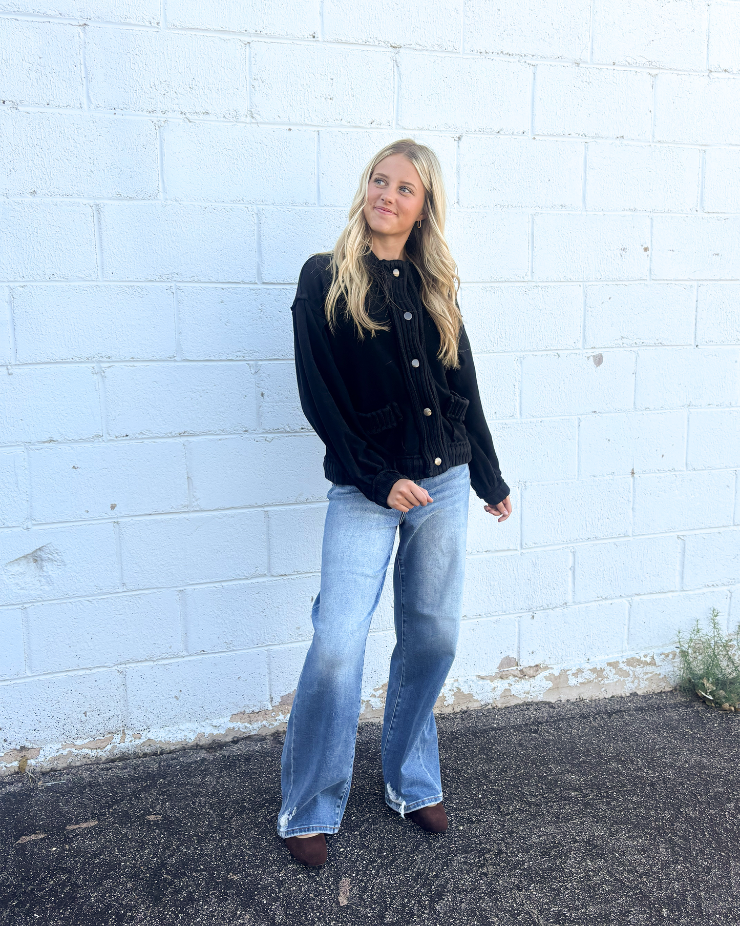 Black , loose fitting sweater jacket