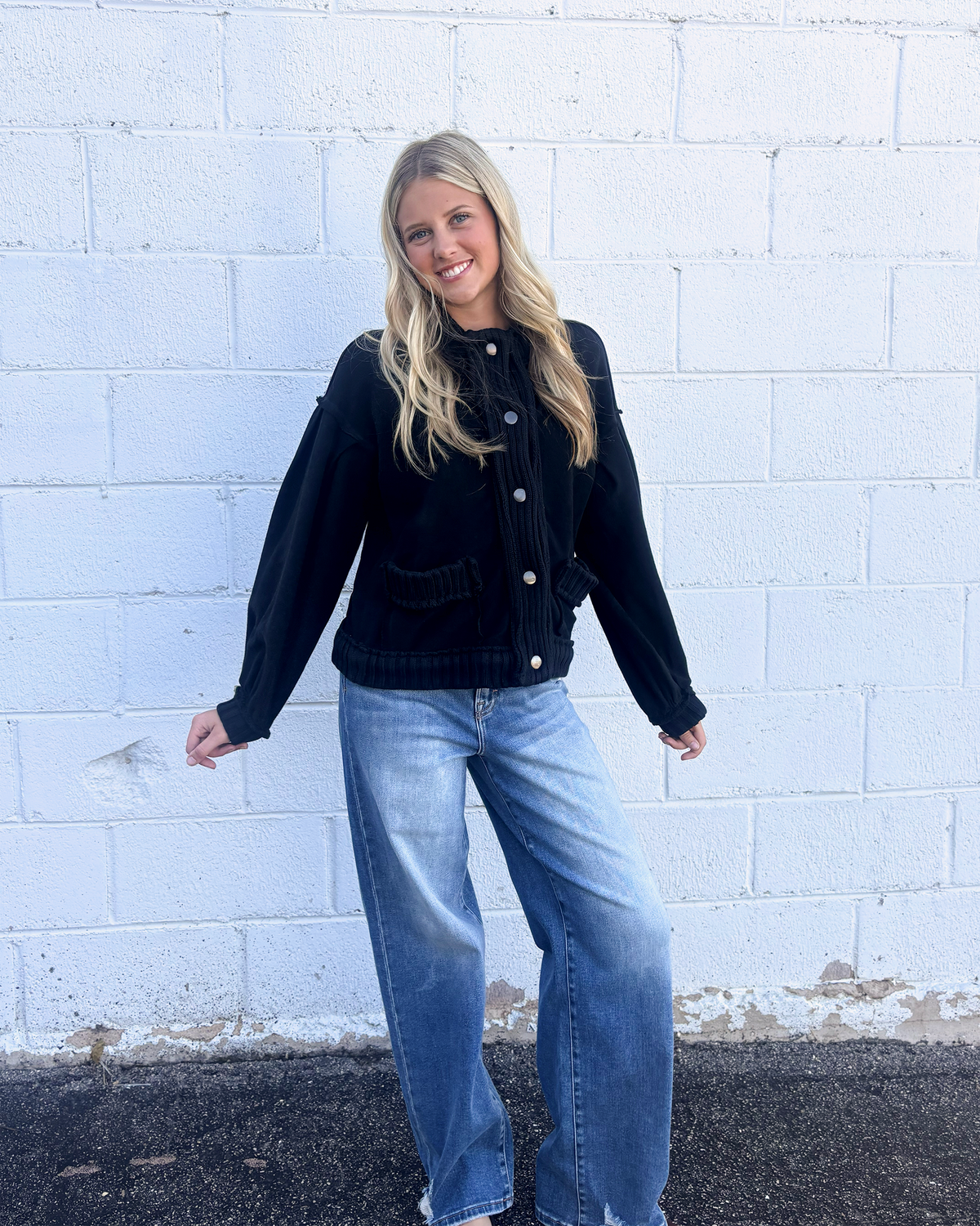 Black , loose fitting sweater jacket