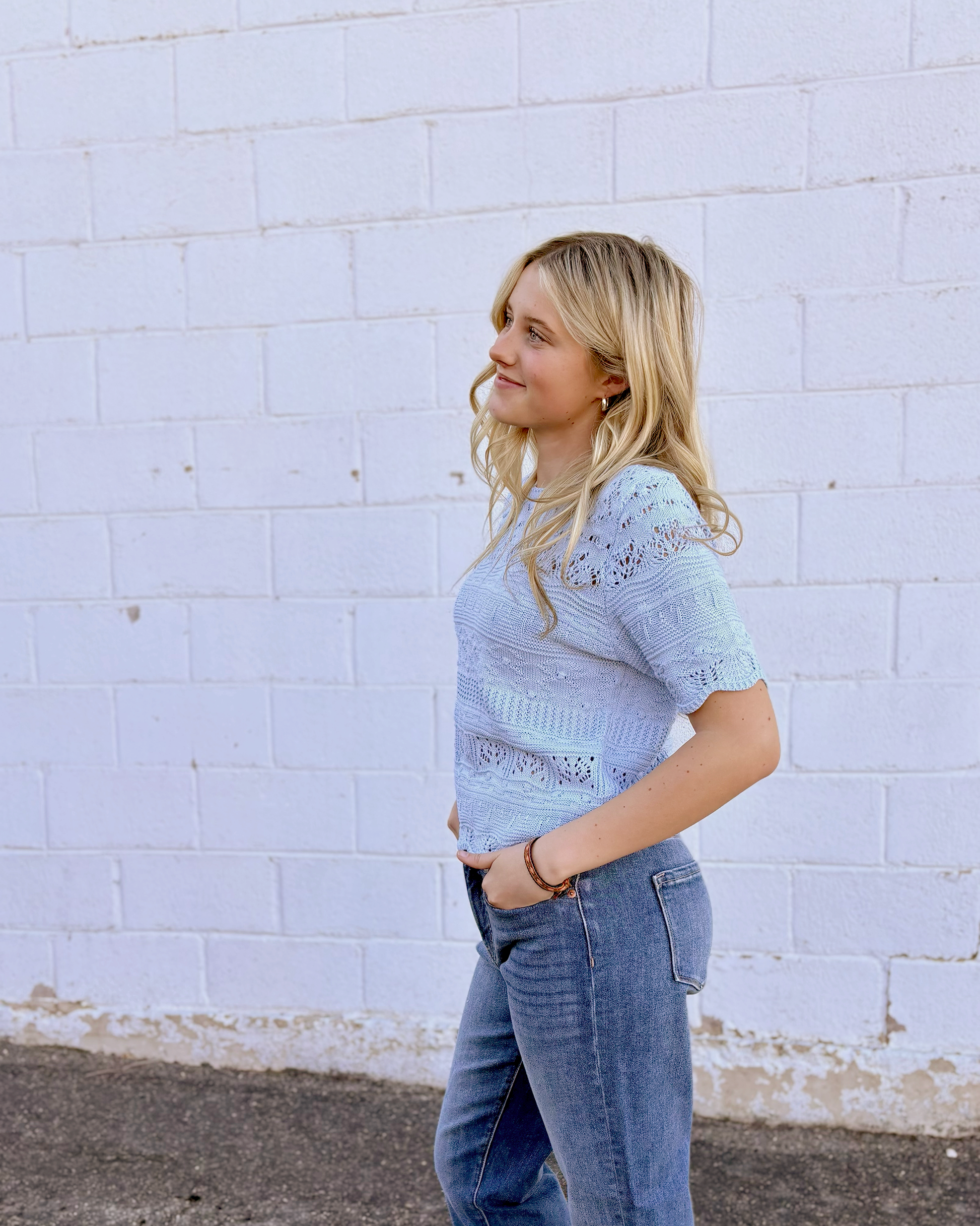 textured blue knit top with short sleeves