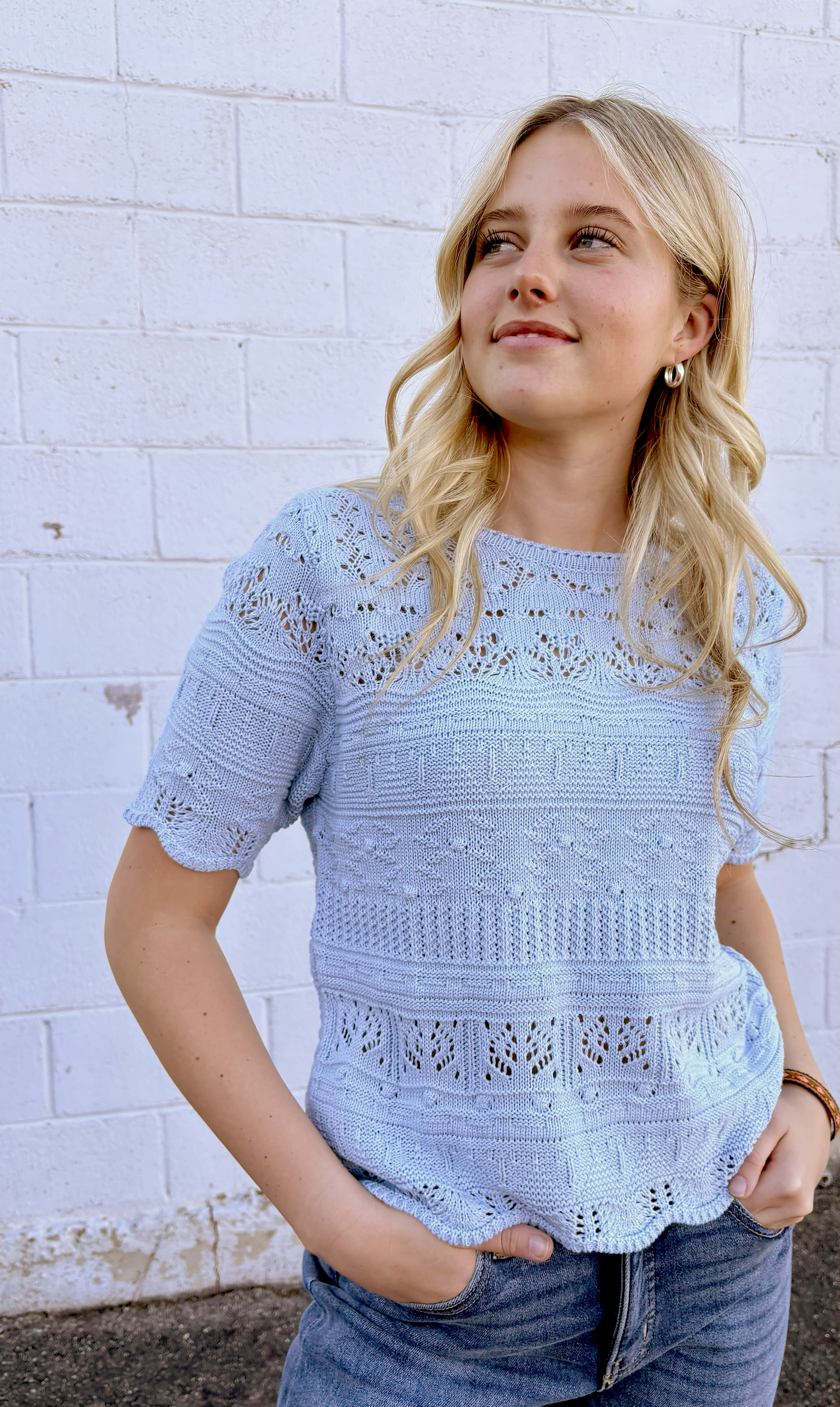textured blue knit top with short sleeves