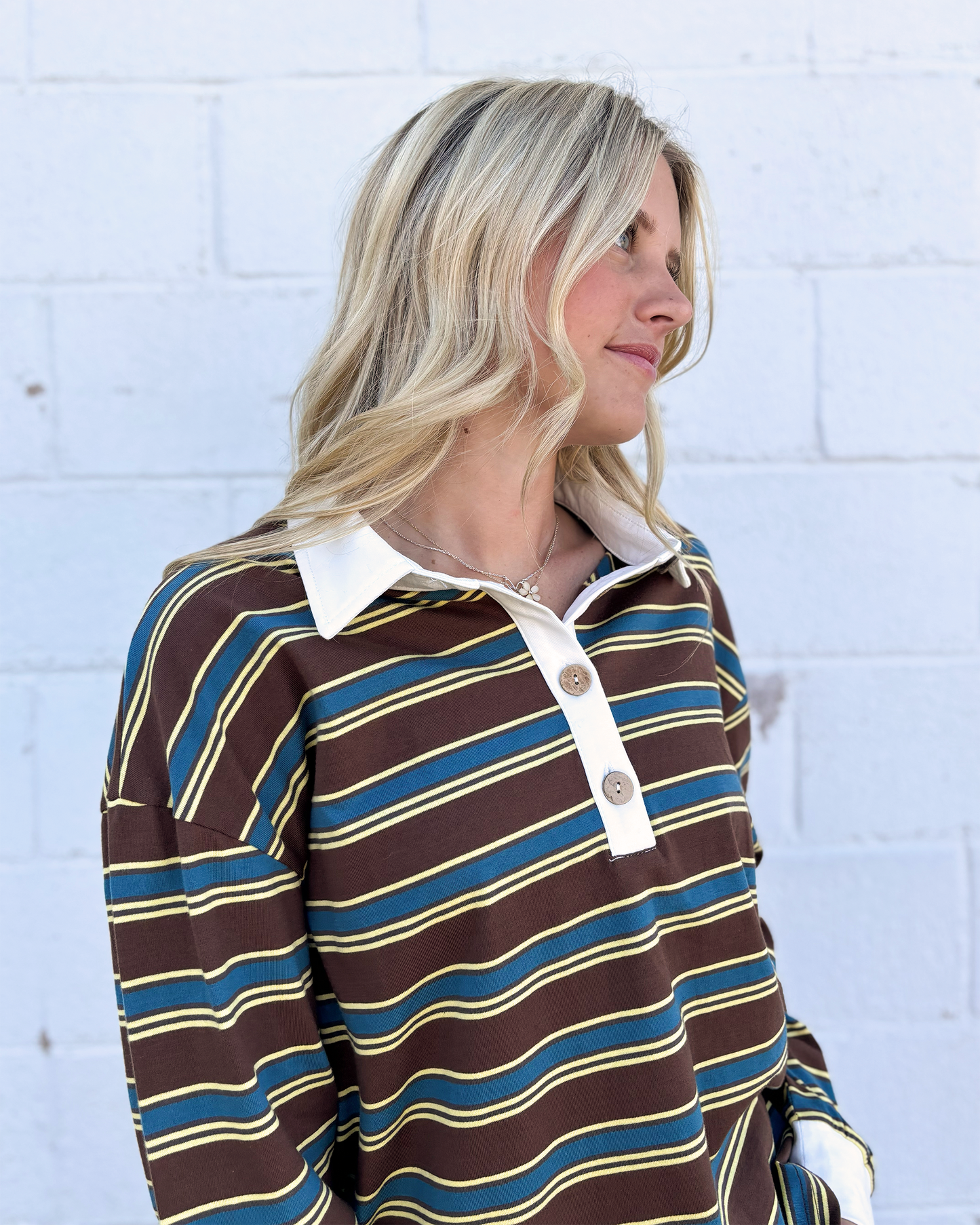 brown and blue striped polo