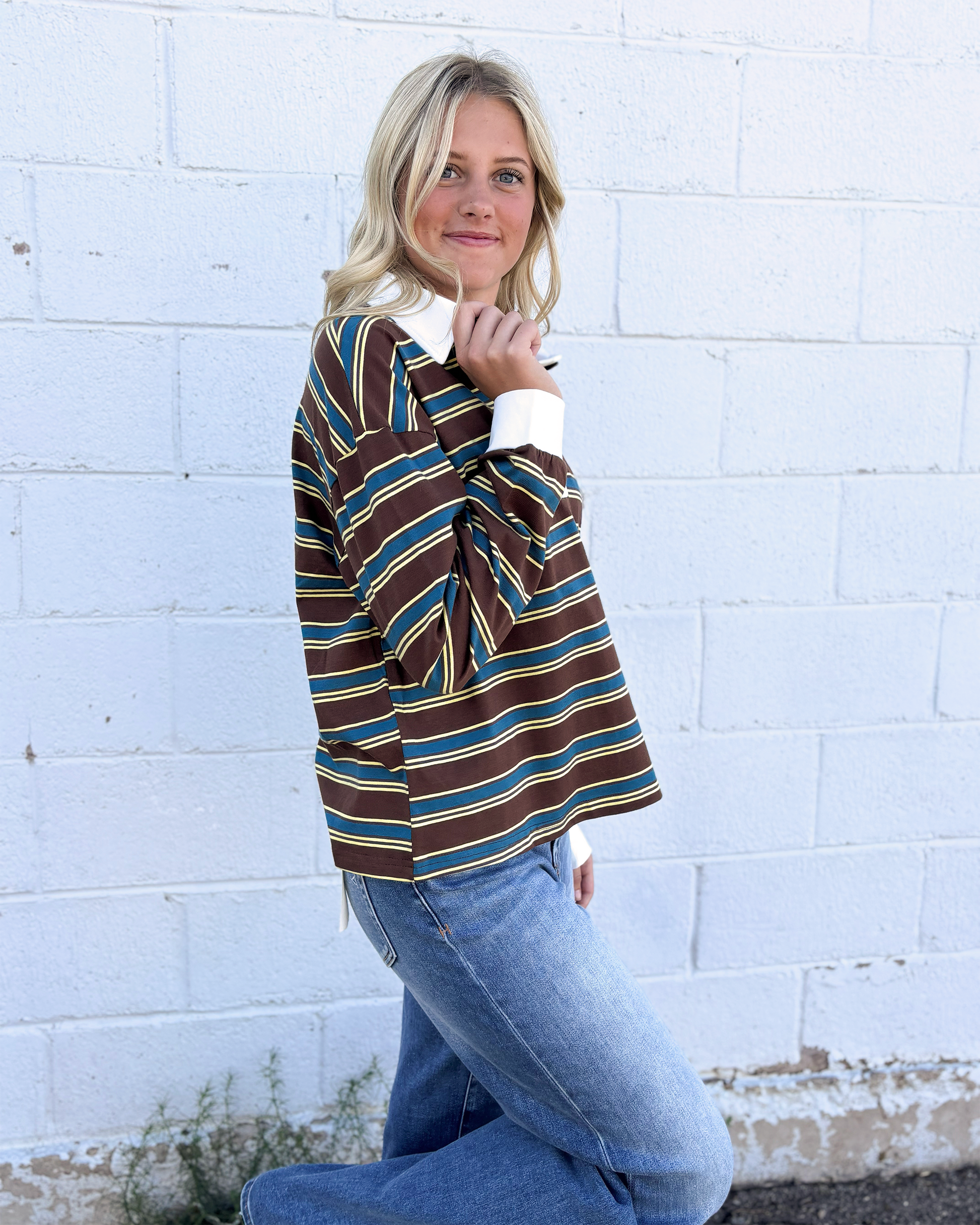 brown and blue striped polo