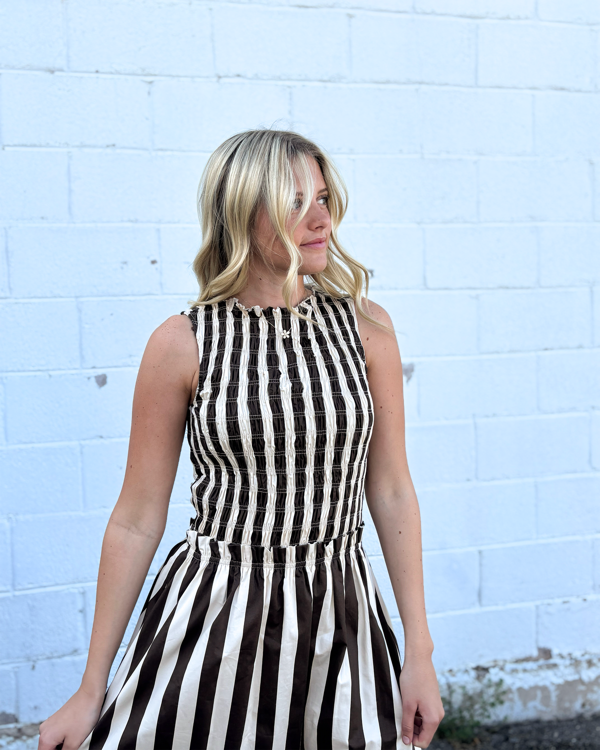 Sleeveless dress with brown and ivory striped dress