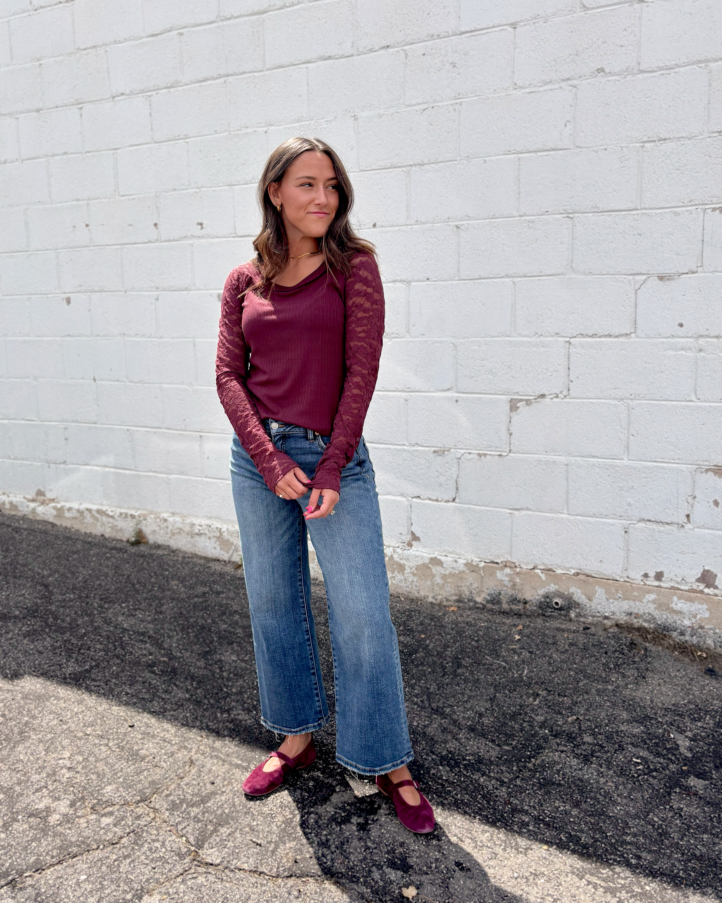 Burgundy top with lace long sleeves and scoop neckline