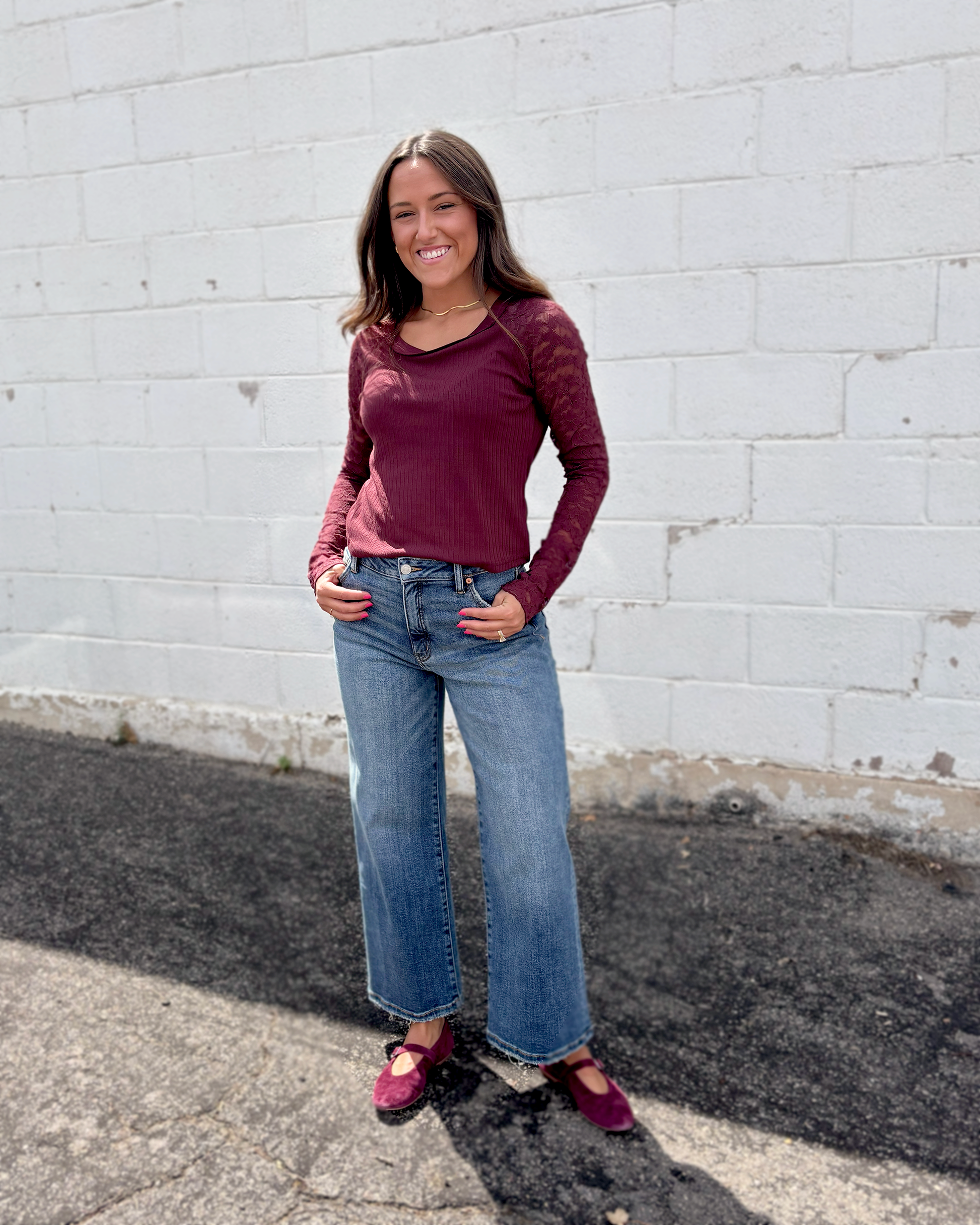 Burgundy top with lace long sleeves and scoop neckline