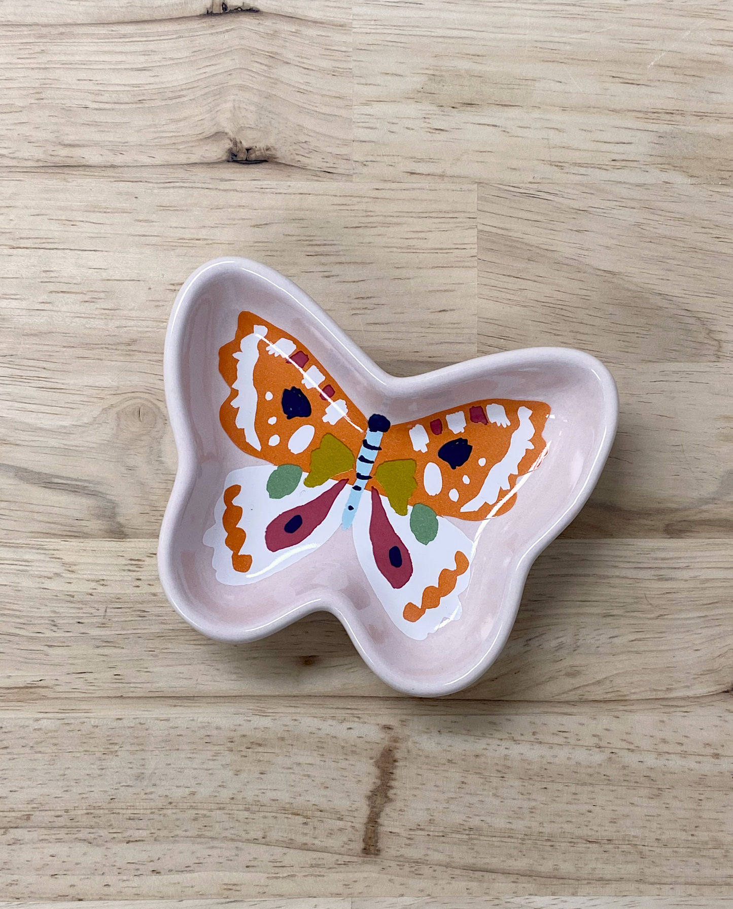 butterfly trinket dish with orange highlights