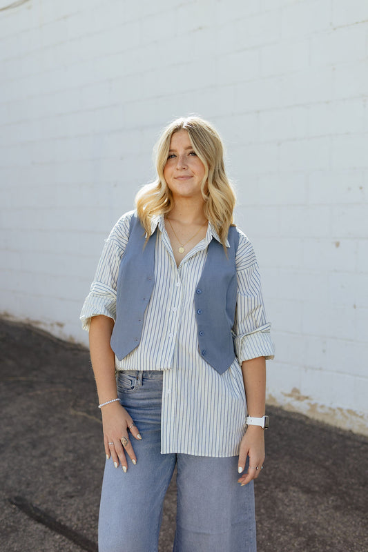 Button up vest in a light blue