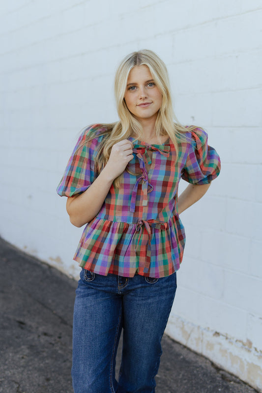 Plaid top with peplum and ties up the front