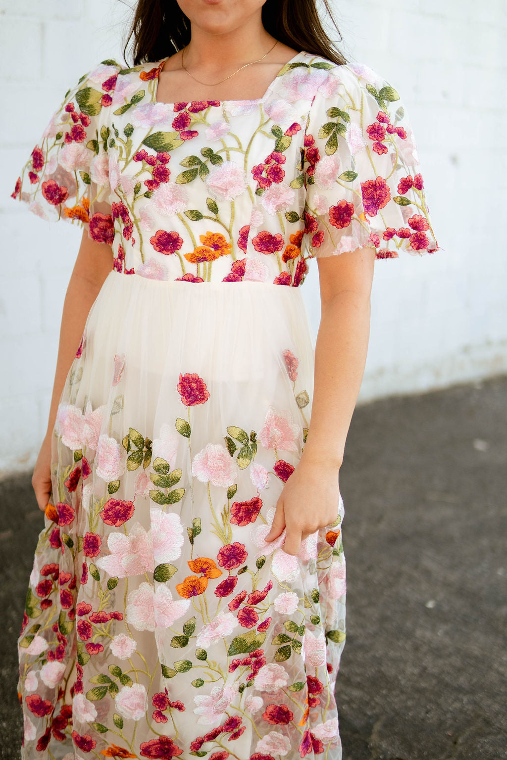 Spring floral dress with empire waist and floral embroidery