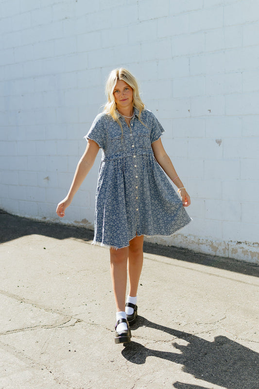 Denim a-line dress with light colored floral pattern