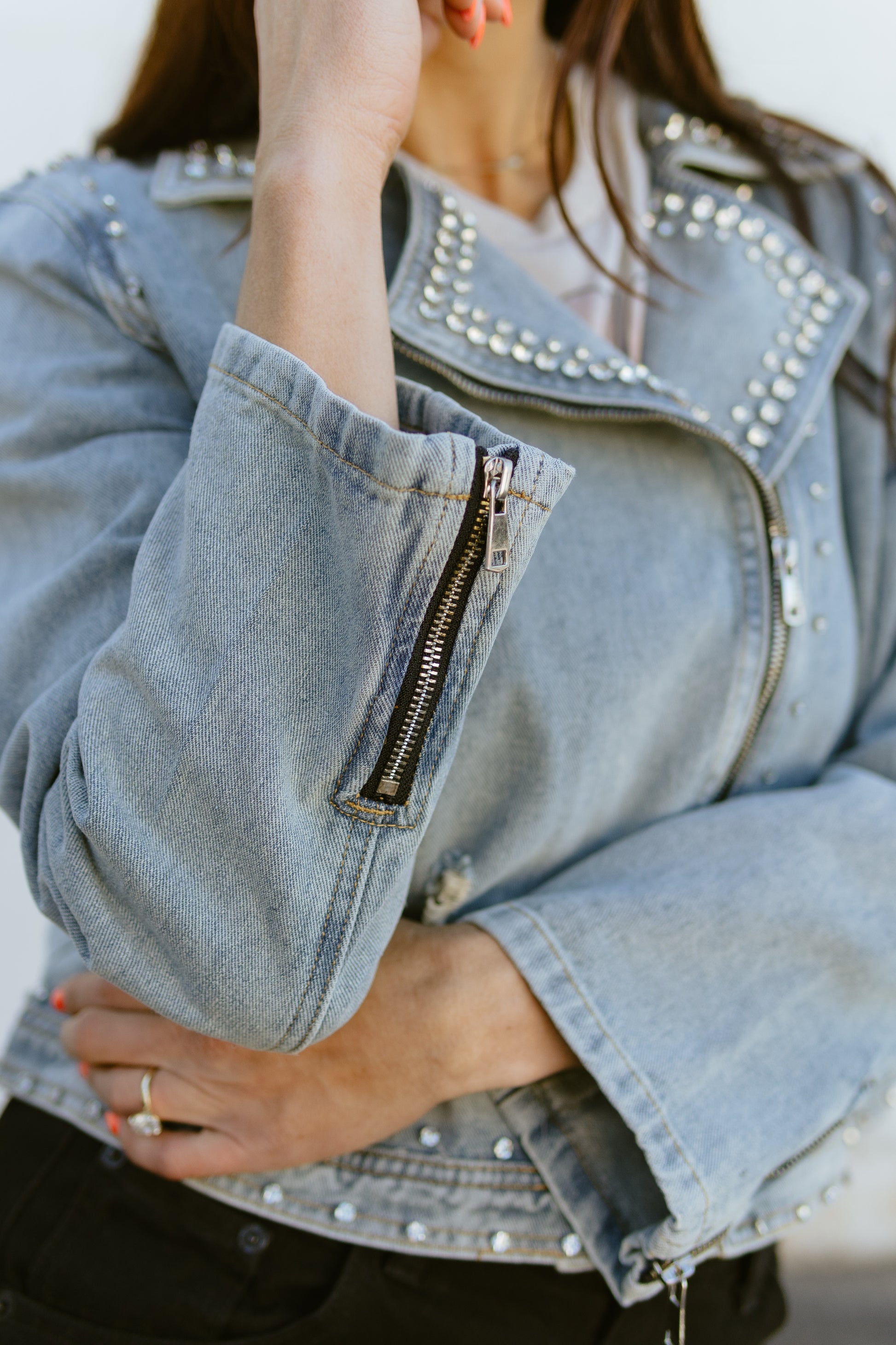 denim jacket with rhinestone details