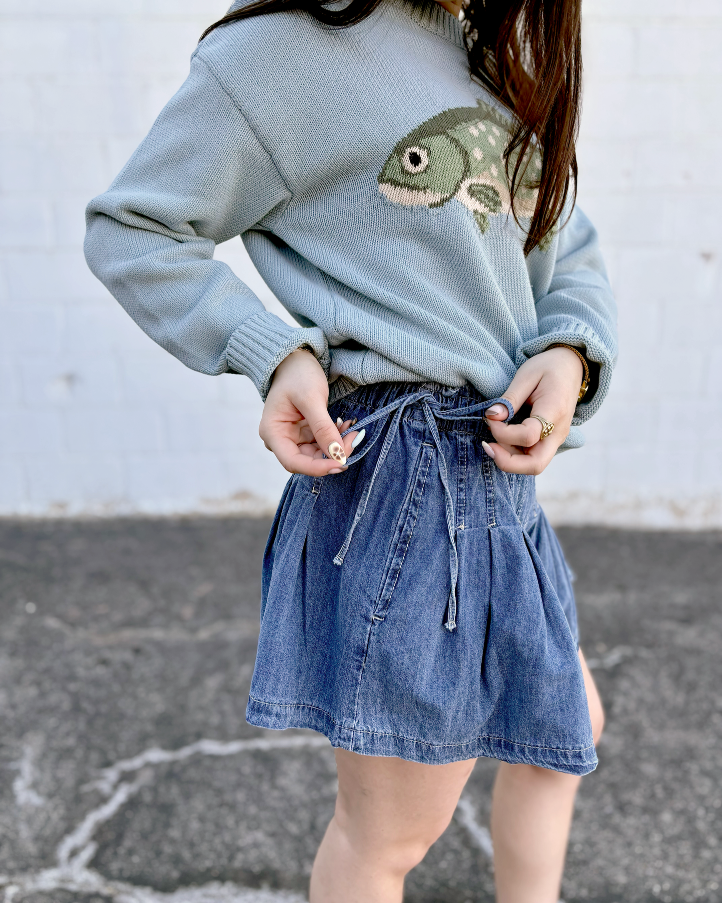 short denim pleated shorts with ties on the sides
