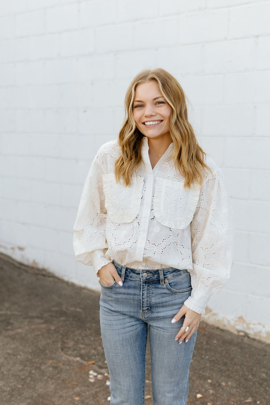 Eyelet button up top with puff sleeves