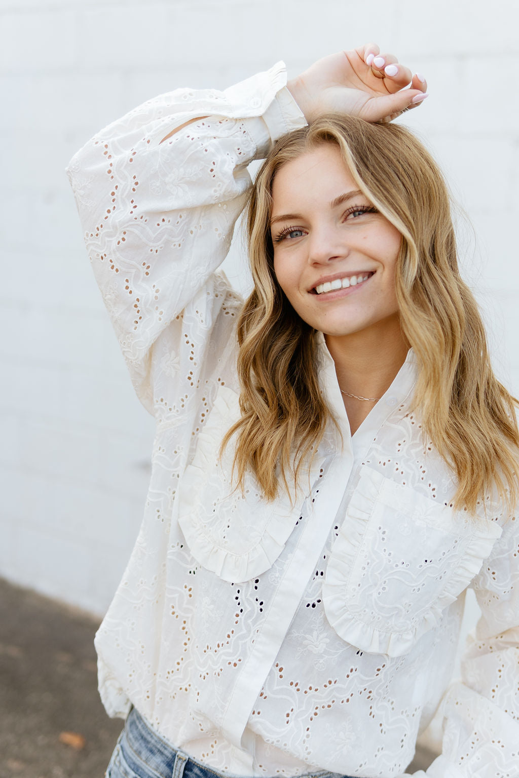 Eyelet button up top with puff sleeves