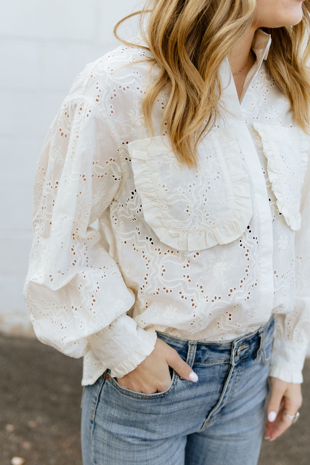 Eyelet button up top with puff sleeves