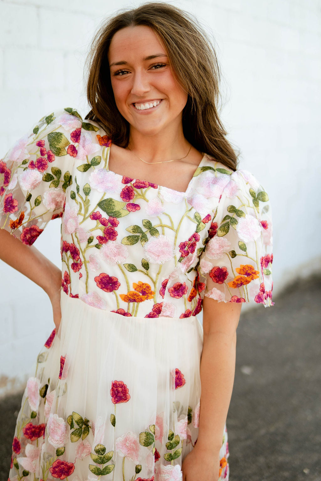 Spring floral dress with empire waist and floral embroidery