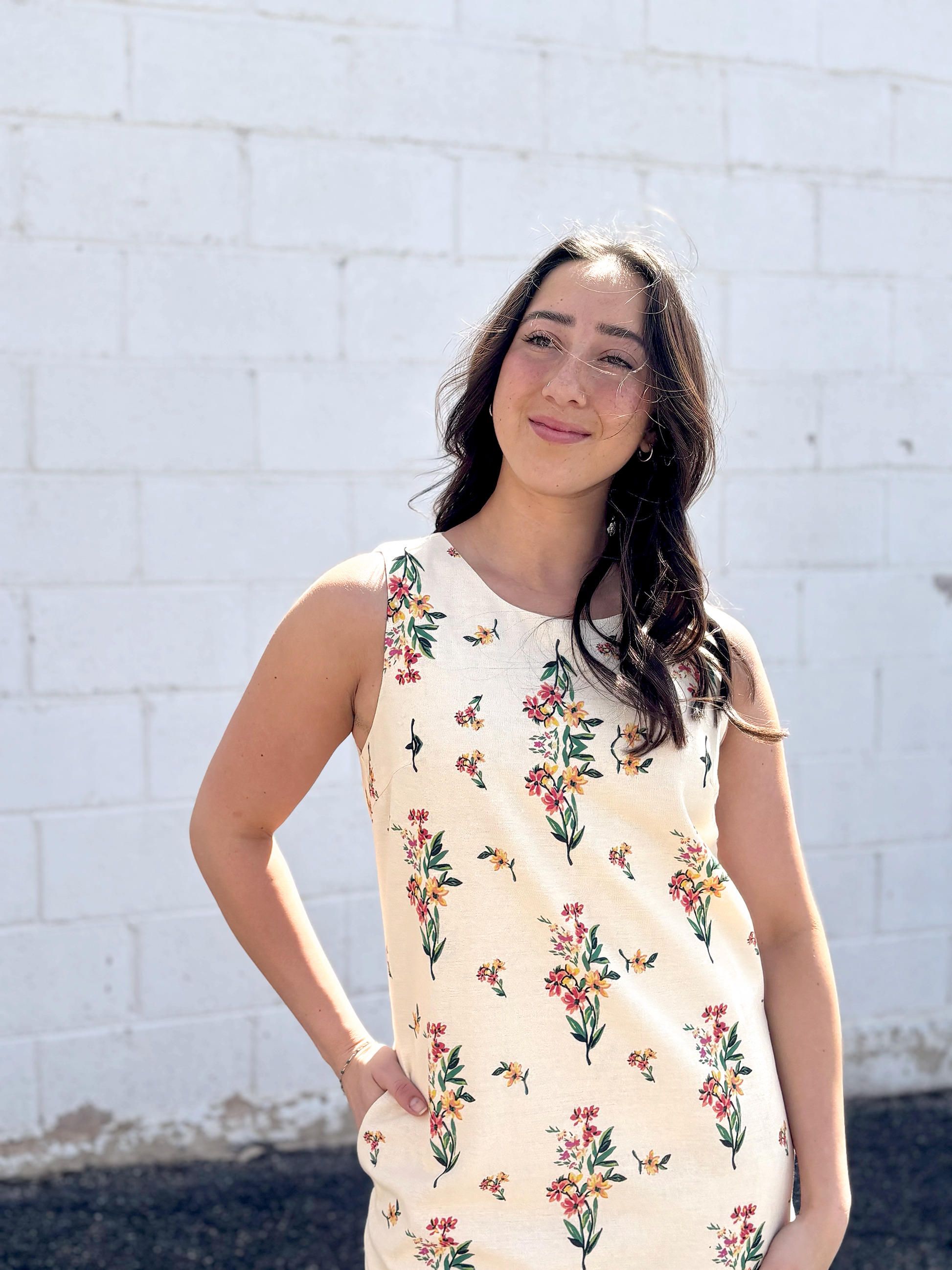 Cute short sleeveless dress with floral pattern